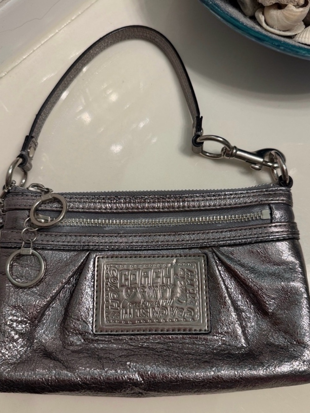 Coach Poppy Metallic Silver Leather Wristlet